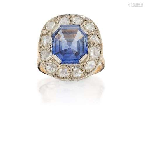 A sapphire and diamond cluster ring, the rectangular-cut cor...