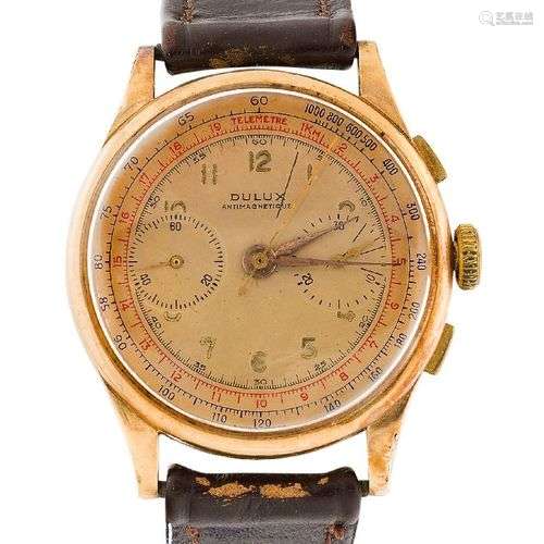 An 18ct gold wristwatch, with stop watch, the silvered dial ...
