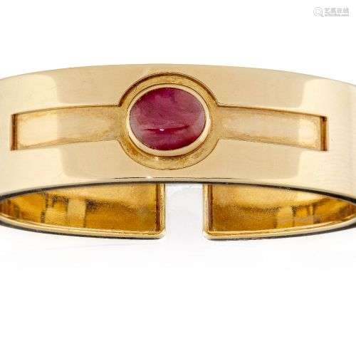 A ruby single stone cuff bangle, by Bulgari, with double hin...