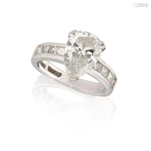 A diamond single stone ring, the pear-shaped diamond, weighi...