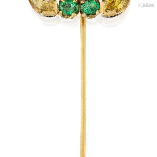 A yellow diamond, emerald and amethyst stickpin, composed of...