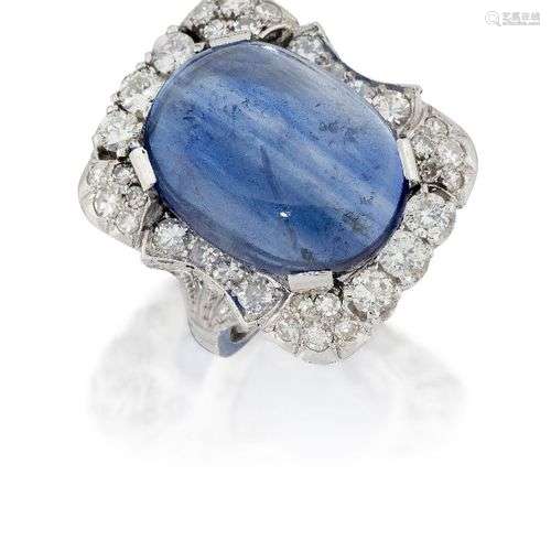 An impressive, sapphire and diamond ring, the large cushion ...