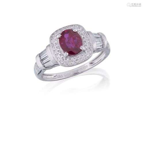 A ruby and diamond ring, the oval mixed-cut ruby, weighing a...