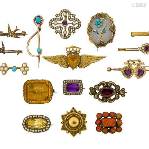 A group of sixteen various brooches, comprising: a late 19th...