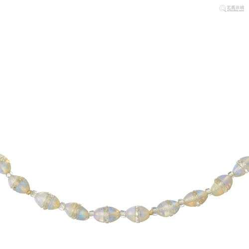 An opal necklace, composed of a single row of opal and facet...