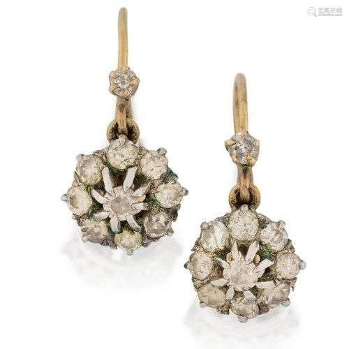 A pair of diamond cluster drop earrings, designed with singl...