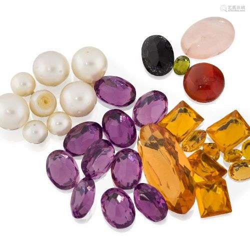 Une collection de pierres précieuses, de perles de culture e...