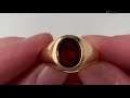 A 14k gold garnet ring