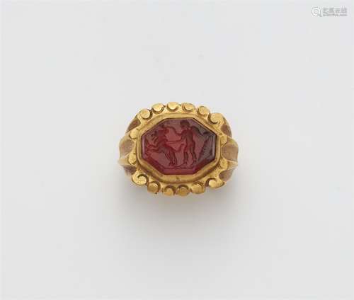 A 21k gold ring with a Roman intaglio