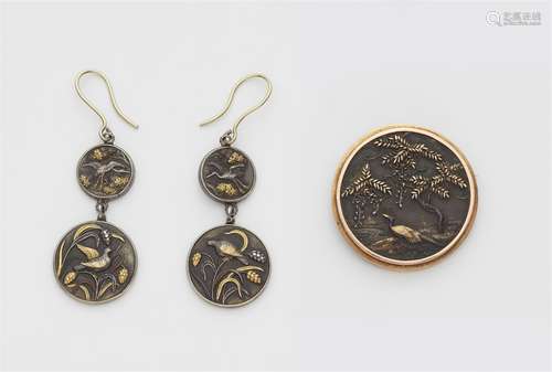 A set of jewellery made with Japanese shakudo plaques