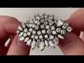 An 18k white gold and diamond brooch