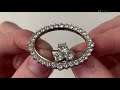 An 18k white gold and diamond brooch