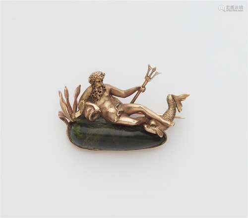 A 14k red gold Poseidon brooch