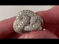 An 18k braided white gold diamond ring