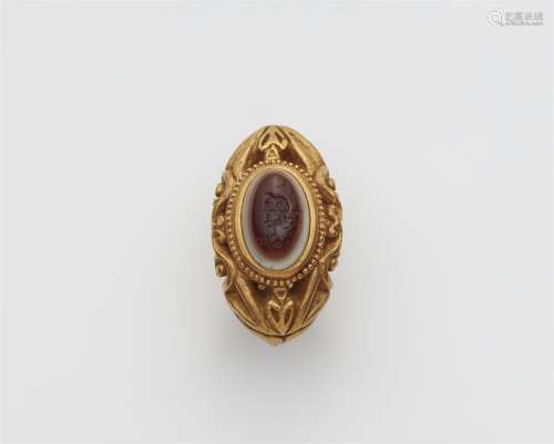 A 22k gold ring with an ancient intaglio