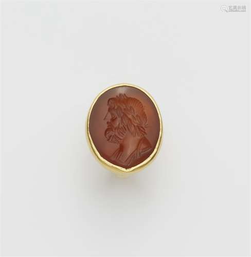 An 18k gold ring with a neoclassical intaglio