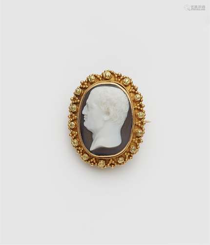 An 18k gold sardonyx cameo brooch