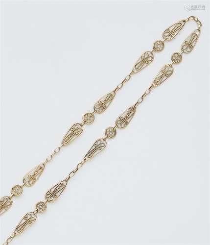 A French 18k gold watch chain