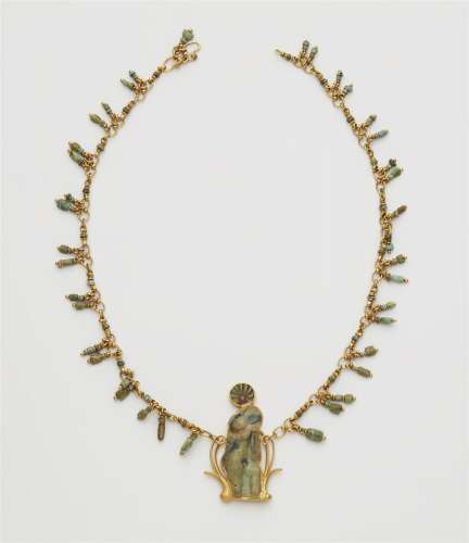 A 22k gold necklace with an ancient Roman relief fragment