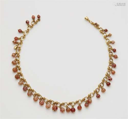 A fringe necklace with ancient carnelian beads