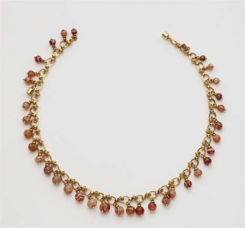 A fringe necklace with ancient carnelian beads