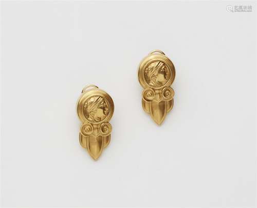 A pair of 18k gold Antique Revival style earrings