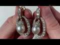 A pair of drop earrings with South Sea pearls