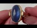 A designer 14k gold sapphire ring