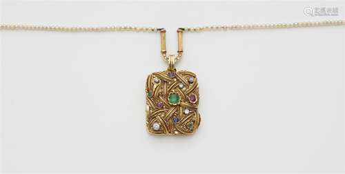 A 14k gold gemstone pendant