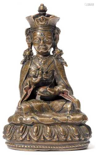 A COPPER ALLOY FIGURE OF PADMASAMBHAVA AS GURU RINPOCHE.