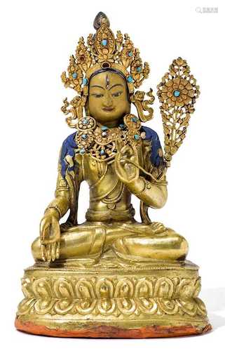 A GILT BRONZE FIGURE OF THE WHITE TARA.