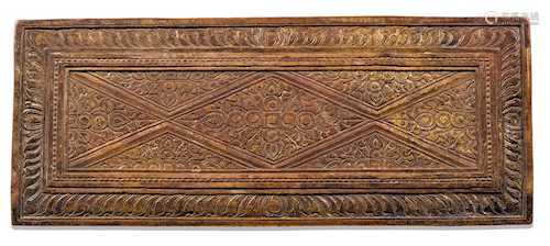A WOODEN SUTRA COVER WITH FLORAL CARVING.