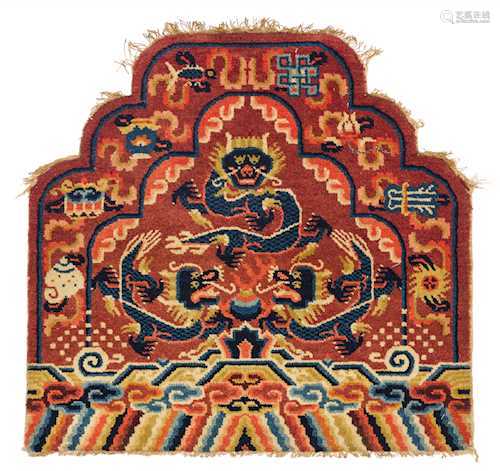 A THRONE CARPET DECORATED WITH THREE DRAGONS.