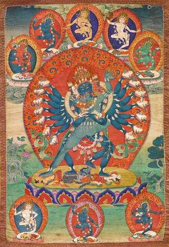 A LARGE THANGKA OF HEVAJRA YAB-YUM.