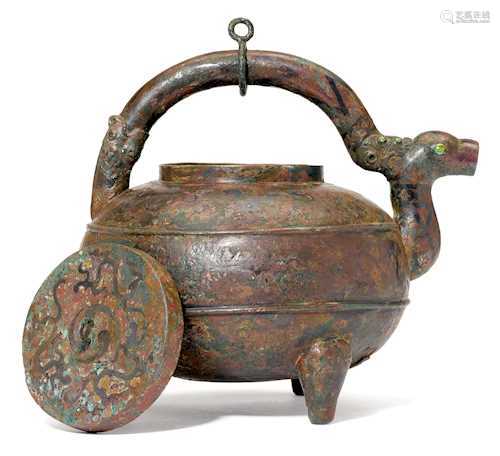 A BRONZE WINE EWER 