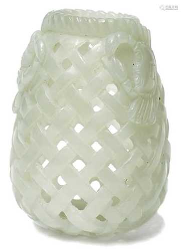 A RETICULATED PALE CELADON JADE CARVING OF A BASKET.