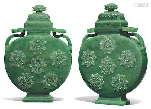 A PAIR OF FINELY CARVED MOON FLASKS AND COVERS.