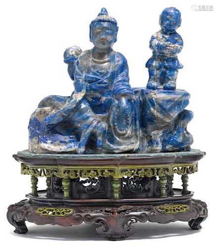 A LAPIS LAZULI CARVING OF A BUDDHA AND A BOY.