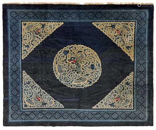 A BAOTOU CARPET WITH CENTRAL DRAGON ROUNDEL.