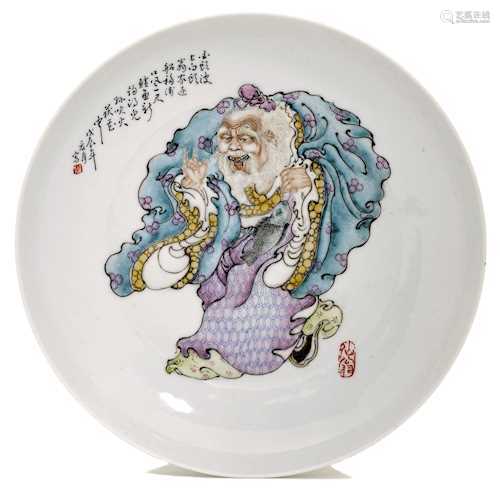 A SMALL FAMILLE ROSE DISH SHOWING AN IMMORTAL.