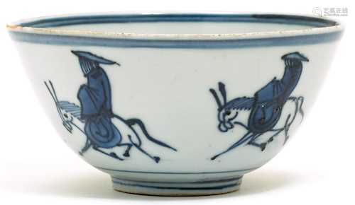 A SMALL BLUE AND WHITE BOWL.