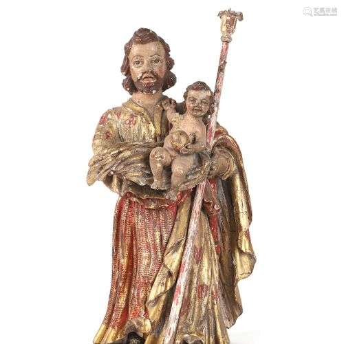Saint Joseph et l’Enfant Jésus en bois sculpté, polychromé e...