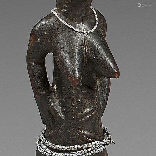 Statuette féminine Baoulé (Côte d'Ivoire). Elle es…