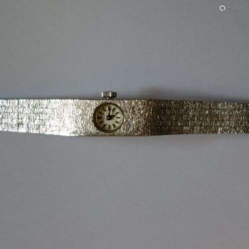 Montre bracelet en or gris 18K (750‰) toscanisé. P…