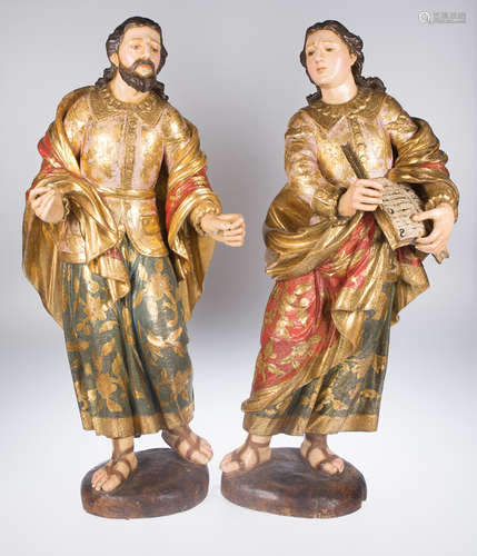 Pair of carved, gilded, estofado and polychromed sculptures....