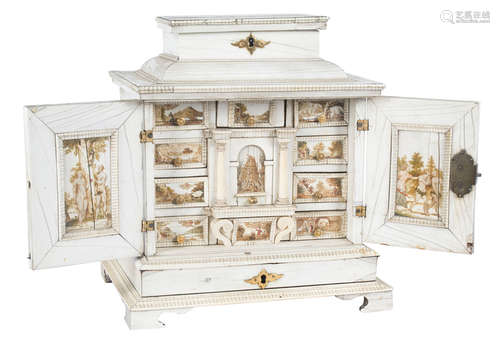 Imposing wooden cabinet covered with ivory and painted ivory...