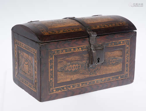 Chest with a curved Oaxaca inlay lid and iron fittings. Colo...