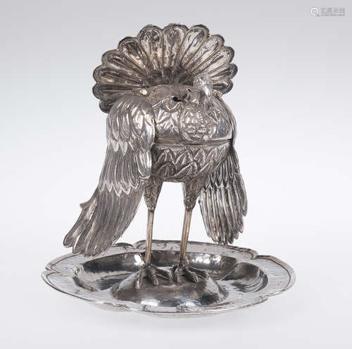 Embossed and chased silver thurible in the shape of peacocks...