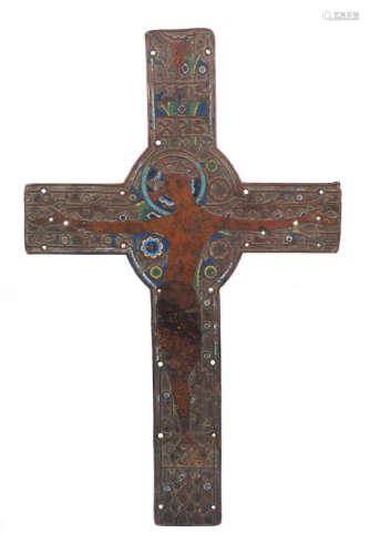 A large chased, engraved and gilded copper cross with champl...
