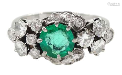 White gold round emerald and diamond cluster ring
